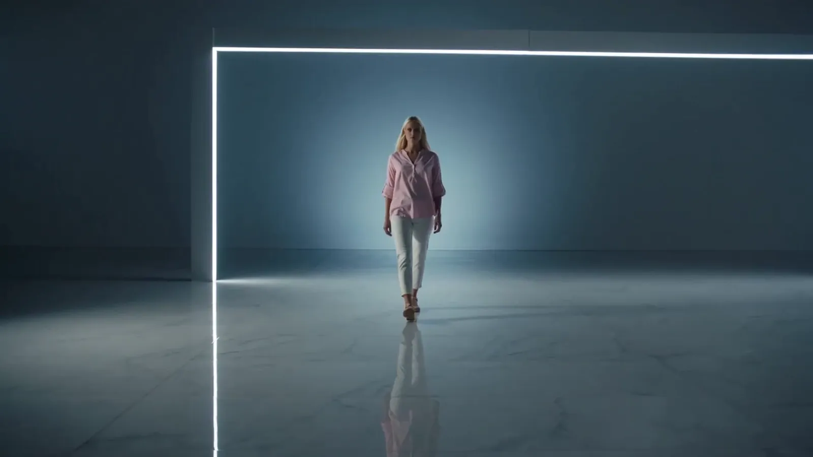 Seasonal apparel spot: silhouette, texture pass, close on the fabric.